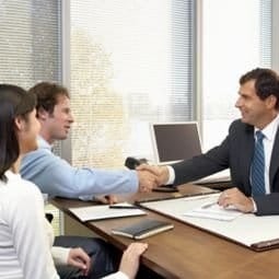 image of a couple and a salesman