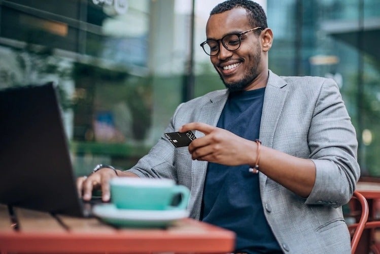 image of a man on a laptop